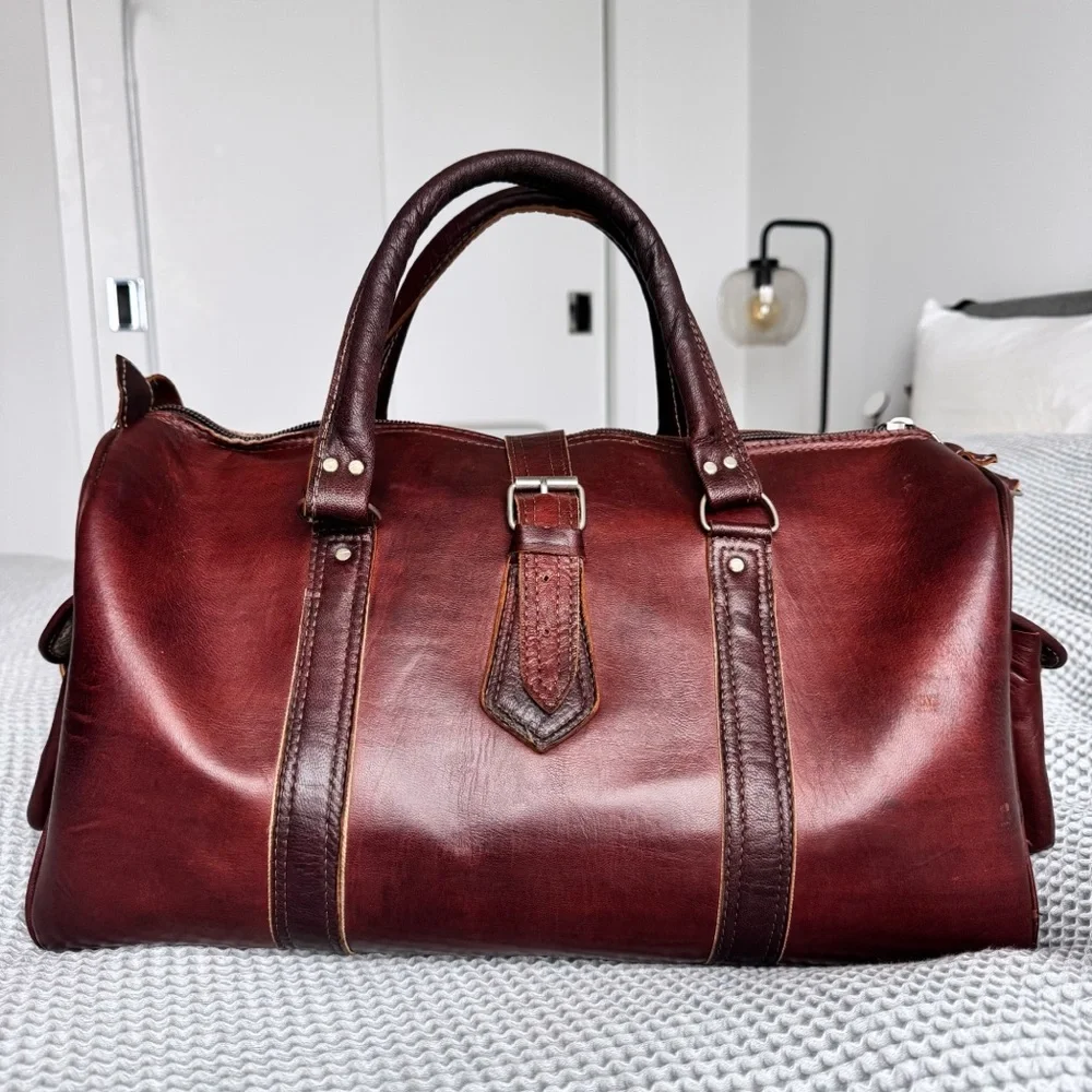 Mahogany Brown Leather Duffel Bag Travel Pattern Lining Side Pockets Vacation
